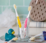 Mouthwatchers toothbrushes in a cup 