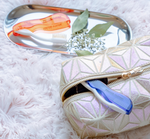 mouthwatchers travel toothbrush in a purse 