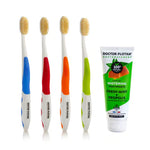 Four Mouthwatchers toothbrushes in assorted colors next to a tube of Doctor Plotka's whitening toothpaste 